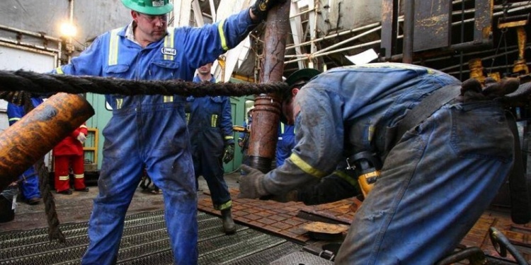 Precision Drilling урегулировала 15-летний спор об оплате времени на надевание СИЗ